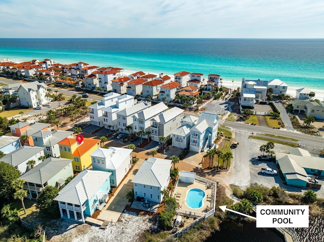 bird's eye view featuring a residential view and a water view