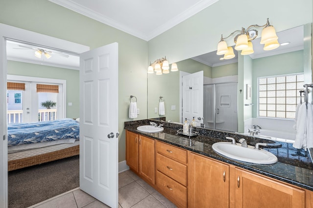 full bath featuring crown molding, a sink, and ensuite bathroom