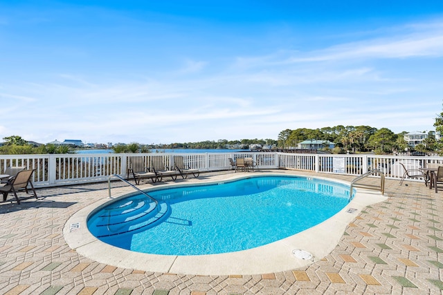 community pool featuring a patio area