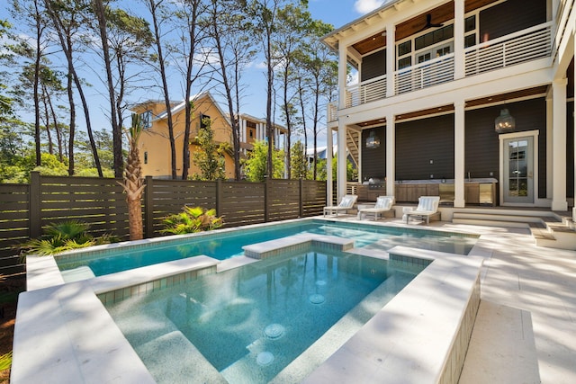 215 Buddy St, Santa Rosa Beach, FL 32459 - view of pool featuring a fenced backyard, a pool with connected hot tub, and a patio area