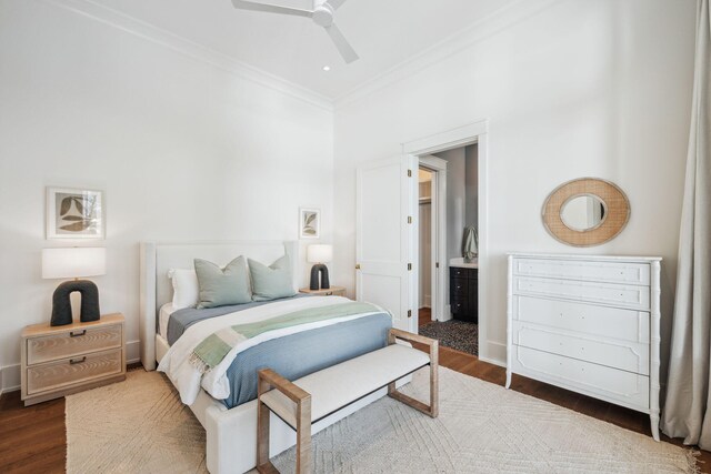 215 Buddy St, Santa Rosa Beach, FL 32459 - bedroom with crown molding, wood finished floors, a towering ceiling, baseboards, and ensuite bathroom