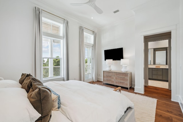 215 Buddy St, Santa Rosa Beach, FL 32459 - bedroom with crown molding, dark wood-type flooring, a ceiling fan, and baseboards
