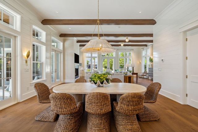 215 Buddy St, Santa Rosa Beach, FL 32459 - dining area with wood finished floors, beam ceiling, french doors, baseboards, and wood walls