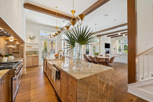 215 Buddy St, Santa Rosa Beach, FL 32459 - kitchen with appliances with stainless steel finishes, beamed ceiling, wood finished floors, french doors, and open floor plan