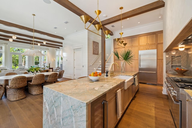 215 Buddy St, Santa Rosa Beach, FL 32459 - kitchen with premium appliances, open floor plan, a sink, beam ceiling, and wine cooler