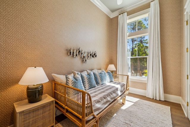 215 Buddy St, Santa Rosa Beach, FL 32459 - sitting room featuring wallpapered walls, baseboards, wood finished floors, and crown molding
