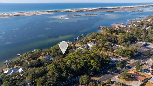 801 E Miracle Strip Pkwy, Mary Esther, FL 32569 - birds eye view of property with a water view