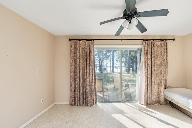 interior space featuring ceiling fan