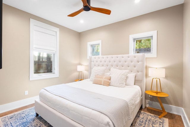 bedroom featuring recessed lighting, ceiling fan, baseboards, and wood finished floors