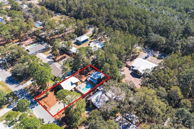 aerial view featuring a forest view