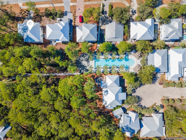 birds eye view of property with a residential view