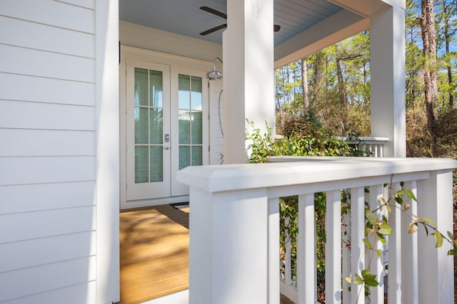 balcony with a porch and french doors