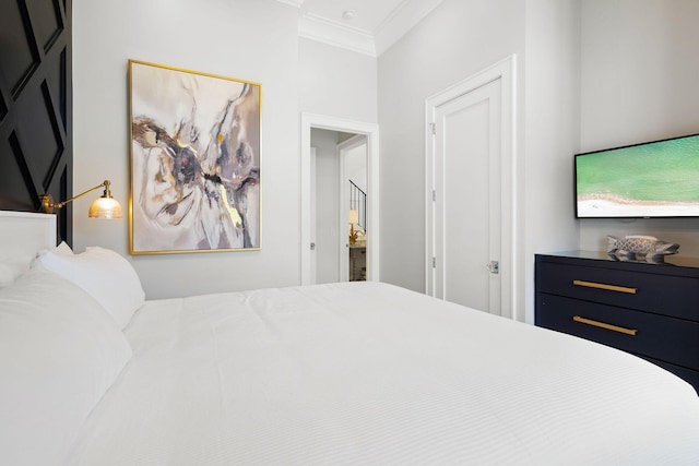 bedroom featuring ornamental molding