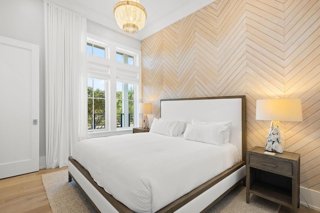 bedroom featuring wood finished floors