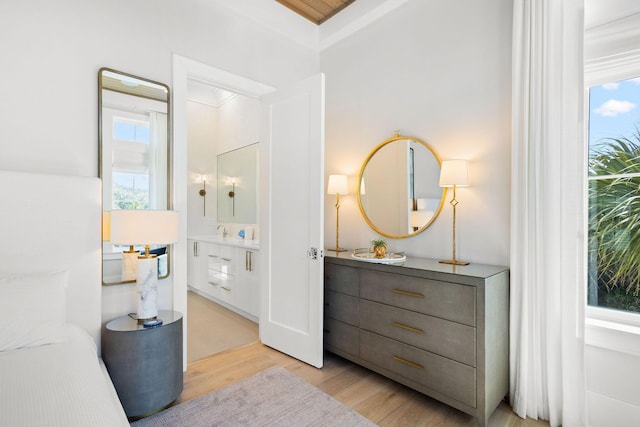 bathroom featuring vanity and wood finished floors