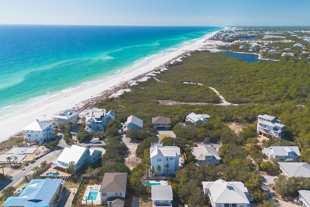 aerial view featuring a beach view and a water view