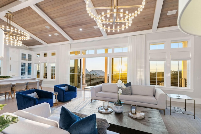 living room with an inviting chandelier, wood ceiling, and beam ceiling