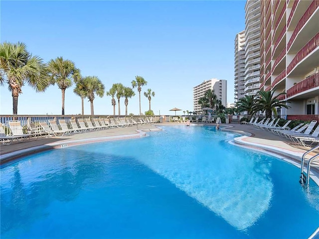 community pool with a patio