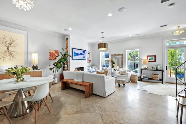 living area featuring ornamental molding, plenty of natural light, visible vents, and recessed lighting