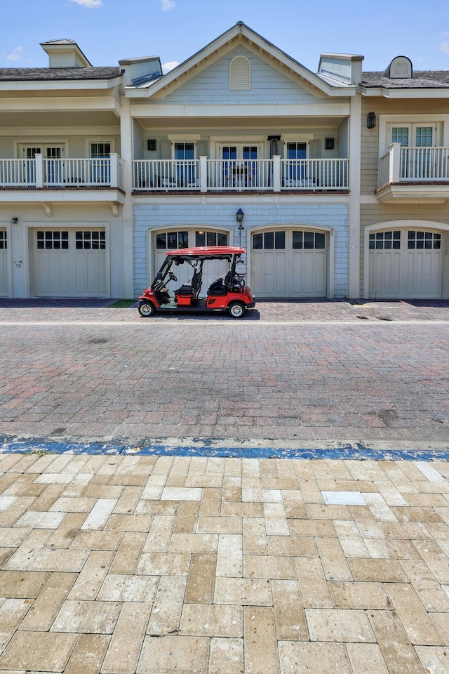 view of front of home with driveway and an attached garage