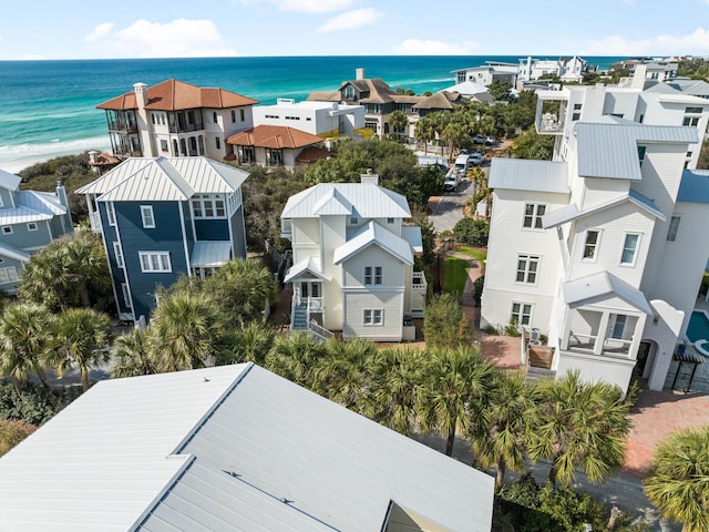 bird's eye view featuring a water view and a residential view