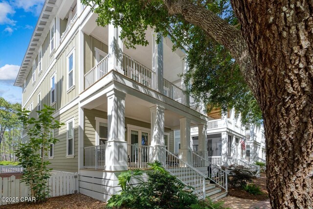 115 Cottage Ct, Panama City Beach, FL 32413 - view of front of home featuring a porch