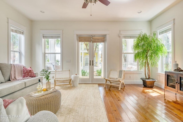 115 Cottage Ct, Panama City Beach, FL 32413 - living room with hardwood / wood-style flooring, ceiling fan, and a wealth of natural light