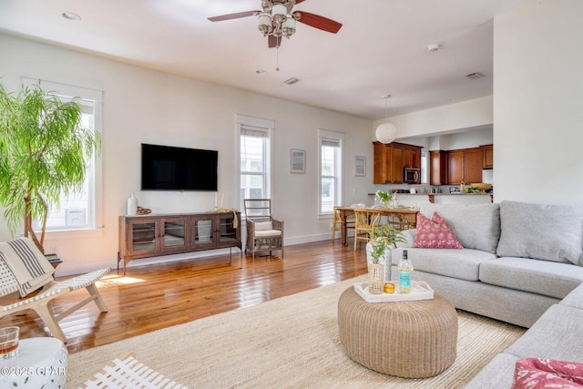115 Cottage Ct, Panama City Beach, FL 32413 - living room with light hardwood / wood-style floors and ceiling fan