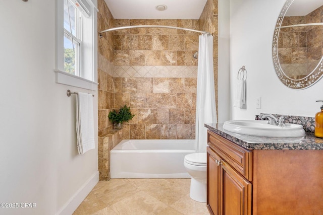 115 Cottage Ct, Panama City Beach, FL 32413 - full bathroom featuring vanity, shower / tub combo with curtain, tile patterned floors, and toilet