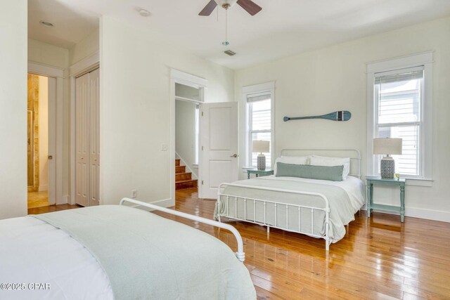 115 Cottage Ct, Panama City Beach, FL 32413 - bedroom with hardwood / wood-style flooring and ceiling fan