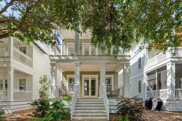 115 Cottage Ct, Panama City Beach, FL 32413 - view of front of home with a porch