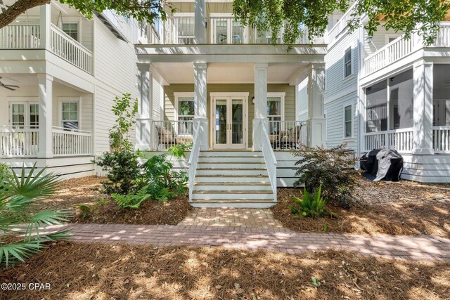 115 Cottage Ct, Panama City Beach, FL 32413 - entrance to property featuring a porch
