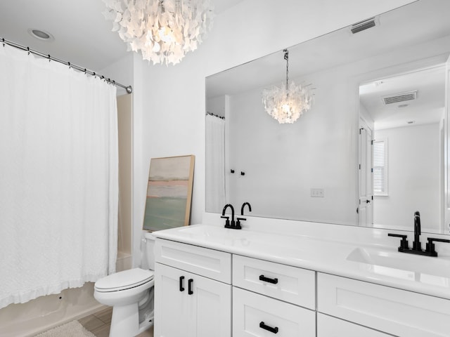 bathroom featuring a chandelier, shower / tub combo, a sink, and double vanity