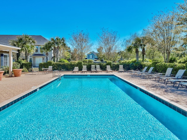 pool with a patio area