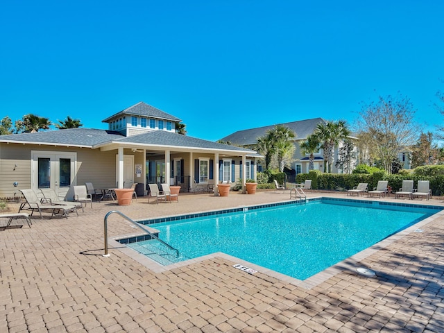 pool with a patio area