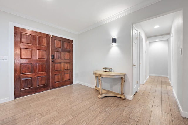 117 Hibiscus Ave, Gulf Breeze, FL 32561 - entrance foyer with light wood-style floors, baseboards, and ornamental molding