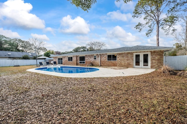 117 Hibiscus Ave, Gulf Breeze, FL 32561 - view of swimming pool with a fenced in pool, fence private yard, french doors, and a patio area