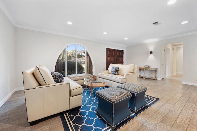 117 Hibiscus Ave, Gulf Breeze, FL 32561 - living room featuring crown molding, wood finished floors, visible vents, and baseboards