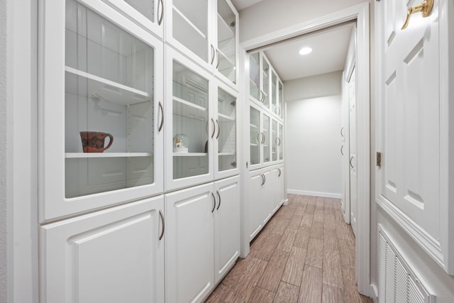 117 Hibiscus Ave, Gulf Breeze, FL 32561 - corridor with baseboards, recessed lighting, visible vents, and light wood-style floors