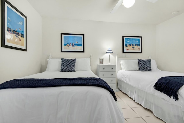 bedroom with light tile patterned floors and ceiling fan