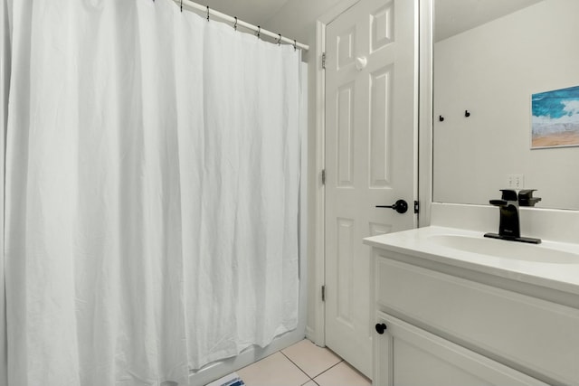 bathroom with vanity and tile patterned floors