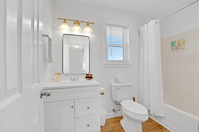 full bathroom featuring toilet, shower / bath combination with curtain, vanity, and wood-type flooring
