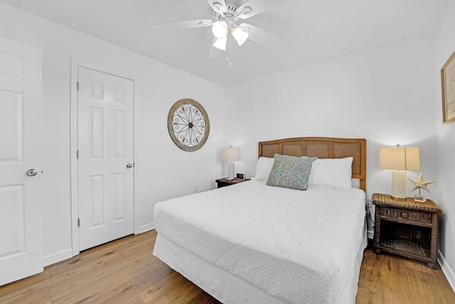 bedroom featuring ceiling fan and light wood-type flooring
