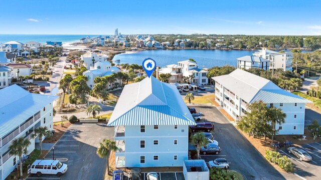 birds eye view of property featuring a water view