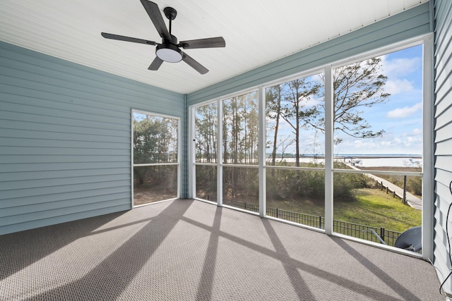 unfurnished sunroom featuring plenty of natural light