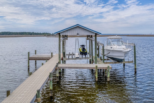 dock area featuring a water view and boat lift