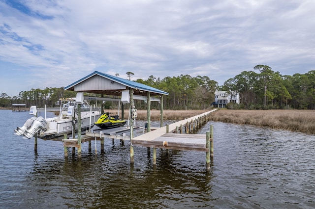 view of dock with a water view and boat lift