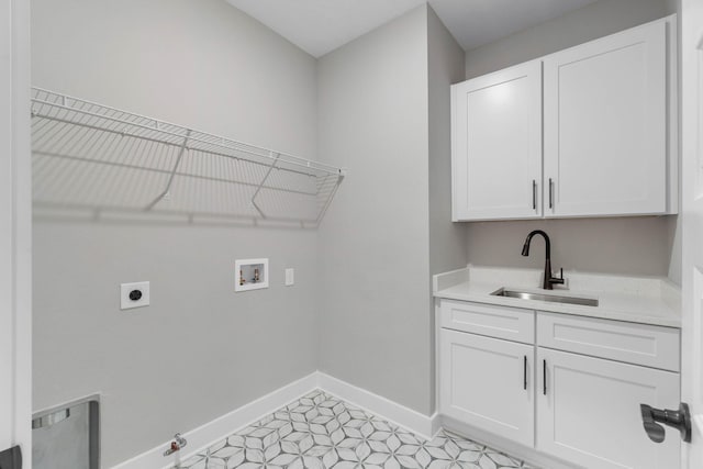 1720 25th St, Niceville, FL 32578 - laundry area with gas dryer hookup, hookup for a washing machine, cabinet space, baseboards, and hookup for an electric dryer