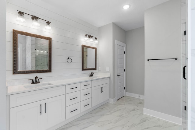 1720 25th St, Niceville, FL 32578 - bathroom featuring a marble finish shower, double vanity, baseboards, marble finish floors, and recessed lighting