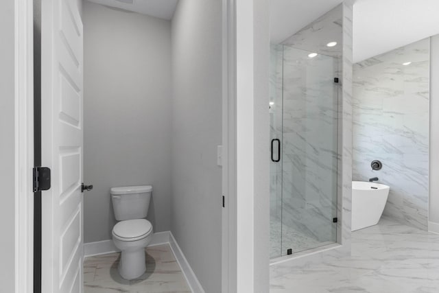 1720 25th St, Niceville, FL 32578 - bathroom featuring marble look tile flooring, a freestanding bath, a marble finish shower, toilet, and baseboards